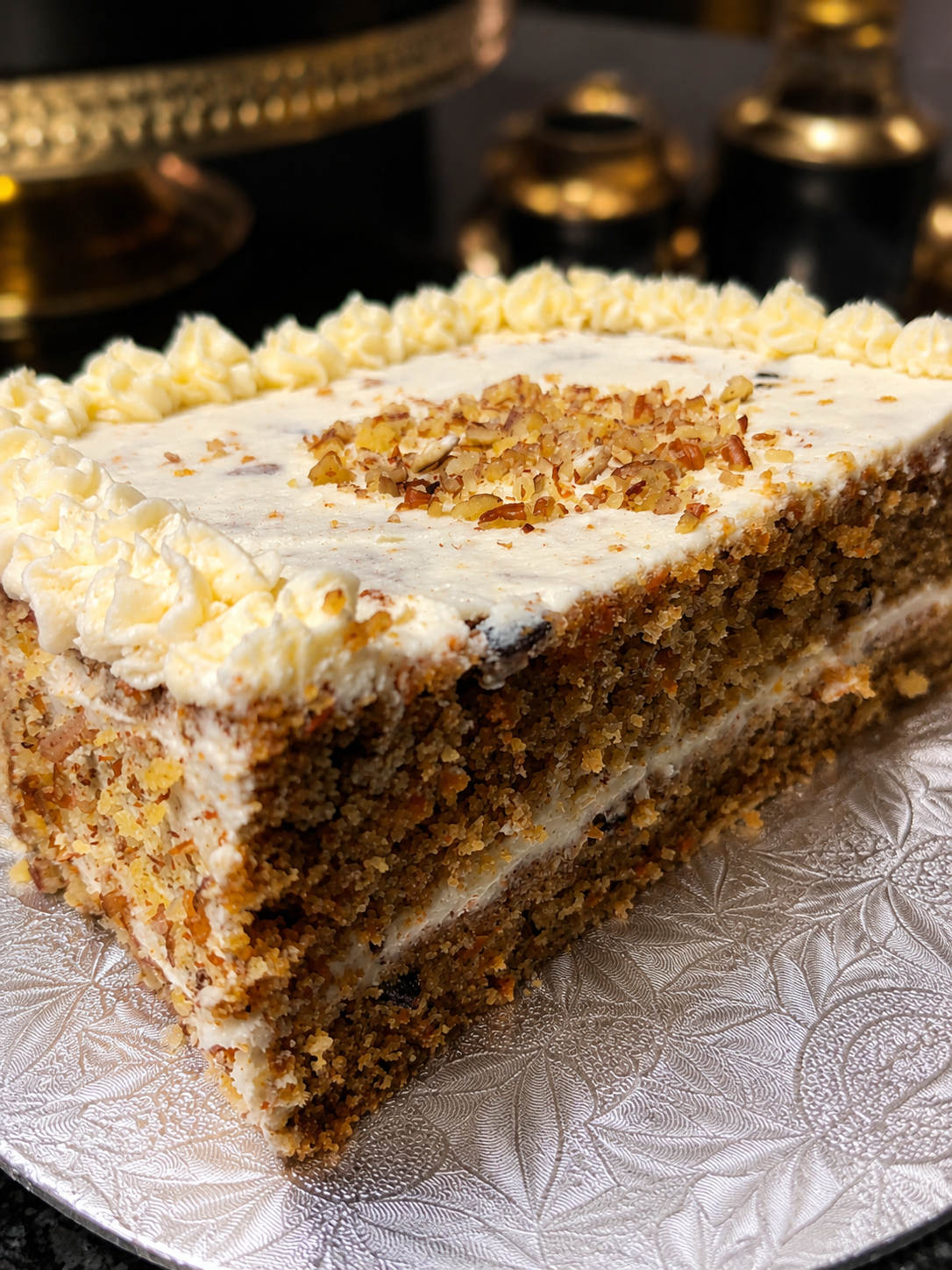 Carrot cake, layered and frosted by hand
