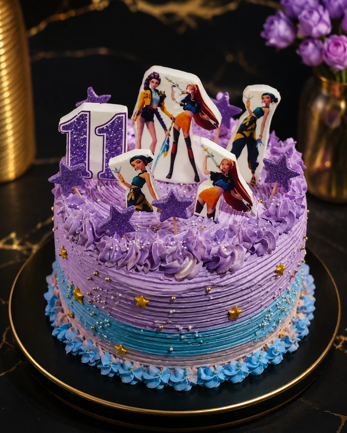 A purple and blue eleventh birthday cake with figurine toppers