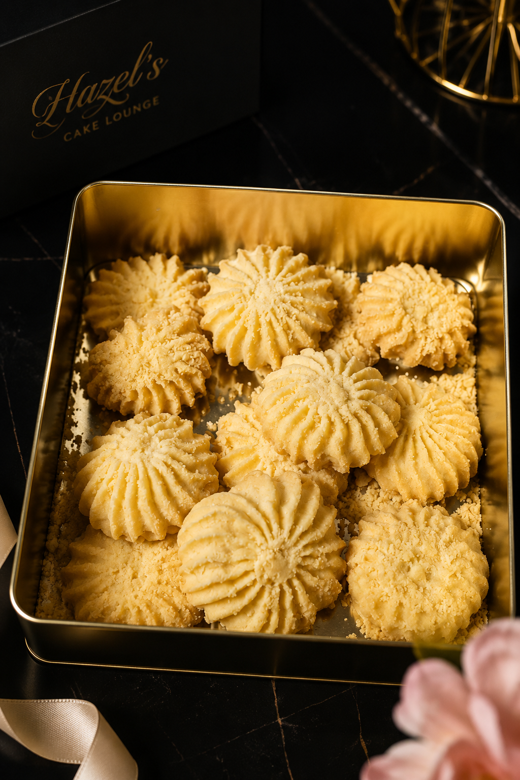 Butter biscuits piped into a Hazel's Cake Lounge tin